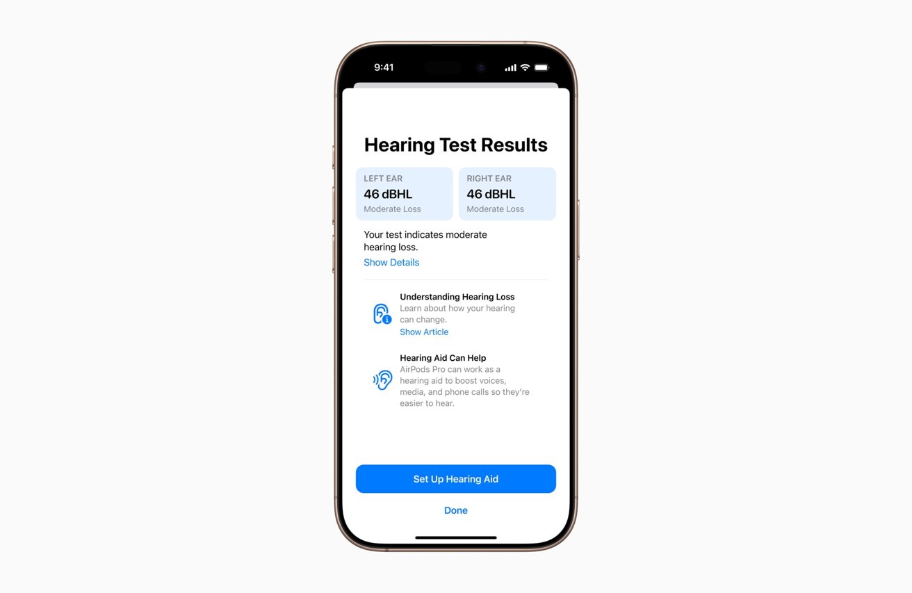 iPhone zobrazuje výsledky sluchových testů, které indikují střední ztrátu sluchu v obou uších s 46 dBHL. Jsou zobrazeny možnosti pro další informace a nastavení sluchadla.