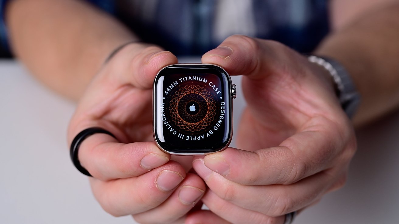 Obrazovka nastavení na Apple Watch, která byla zbarvená do oranžova